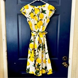 Adorable, cap sleeve lemon dress with tie waist. Perfect condition
